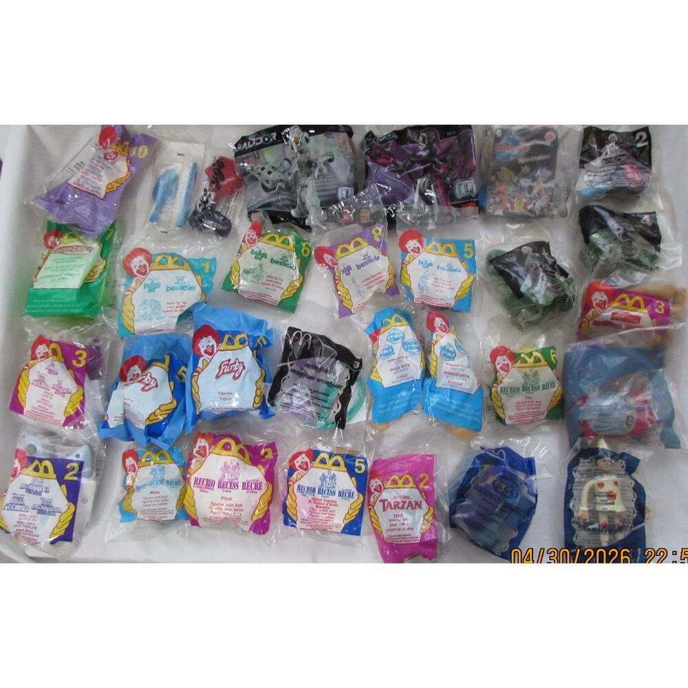 Large lot of McDonald's toys most unopened lego, bugs life, Tarzan, recess, more